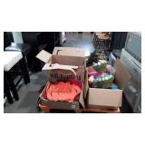 Skid of seasonal decorations and clothes