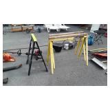 Three Saw Horses, one is a set metal framed,