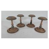 4 stands, possibly for hats 8 inches tall