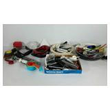 Plastic storage tote with kitchen gadget group,