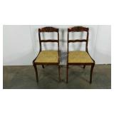 Two chairs, carved details