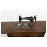 Singer sewing machine with Sewing cabinet