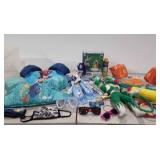 Tote of toys and  swim accessories