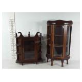 Two wooden trinket cases, one missing a glass