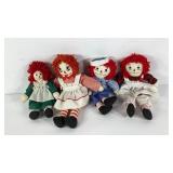 Four small raggedy Ann dolls, two are handmade