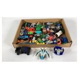 Toys, flat full of cars, tuck, planes, etc.