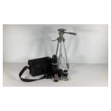 Photographer group, tripod, lenses, light meter,