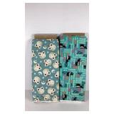 Two bolts of cotton flannel fabric, several yards