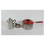 Hand crank pan and decorative coffee pot,
