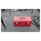 Portable metal Tool box with a few chisels, files