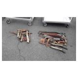 Tools, 2 Group piles include, hatchets, hammers,