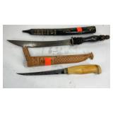 Two knives, J Marttini Finland and a black wooden