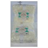 Two reversible faux fur throws. New in packaging.