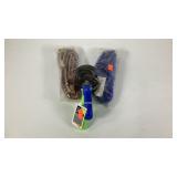 Two curry combs and two barrel reins