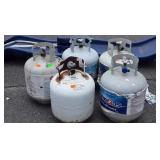 5 Propane Tanks, most are empty couple with small