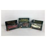 Three Superior die cast replica cars in boxes