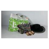 Three bags and a floppy beach hat