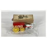 Cast iron ice wagon with horse