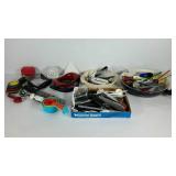 Plastic storage tote with kitchen gadget group,