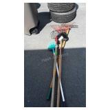 Tool lot yard rakes and dusters