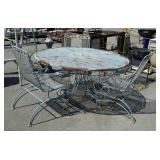 Wrought iron patio table with three chairs needs