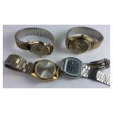 Four wrist watches not running
