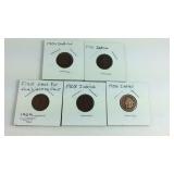 1909 Lincoln cent and four Indian head pennies