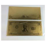 Two goldtone notes $1 and $2