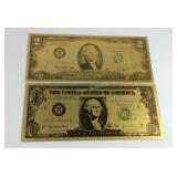 Two goldtone notes $1 and $2