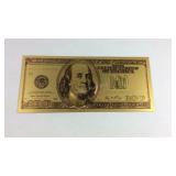 Two goldtone notes $100