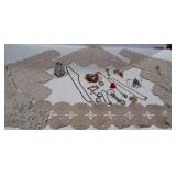 Jewelry and crochet doily lot includes necklaces,