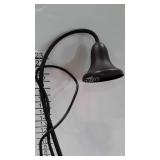 Wrought iron lamp with flower pot base, works