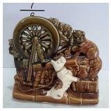 McCoy Pottery spinning wheel planter with dog and