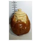 Cookie jar with lid in the shape of a sleeping