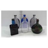 Bottle collection, mostly colored glass -1 is full