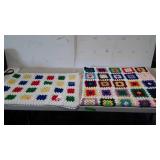 2 crocheted afghans white with green red and