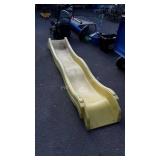 Yellow fiberglass slide