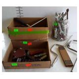 Three containers of tools including wrenches,