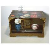 Small storage box with painted flower motif and