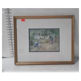 Framed and matted print child in garden with