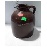 Stoneware jug with larger size spout opening, 1