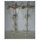 Pair of wrought iron candle stands. 21" high.