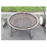 Fire pit, does have bend on one side of it