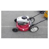 Red push mower, not tested by Hash Auctions