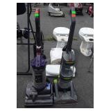 Two Hoover vacuum cleaners