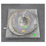 Concrete slab and two concrete plant holders