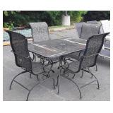 Wrought Iron patio table and four chairs, table