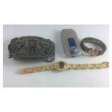 Group with watch, belt buckle, lighter, and a