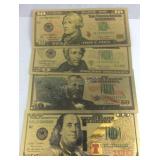 Four goldtone notes $10, $20, $50, $100