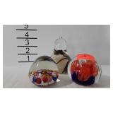 3 Glass paperweights - 1 is pear shaped